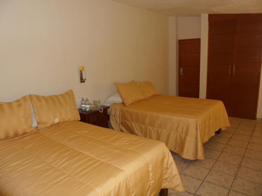 Coral Pacifico Hotel Y Villas Манзанило Стая снимка